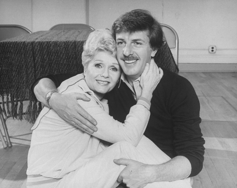 Actors Debbie Reynolds and Jamie Ross Hugging