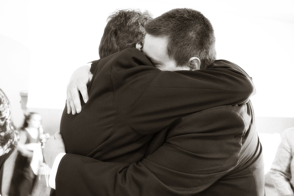 2 Men Hugging