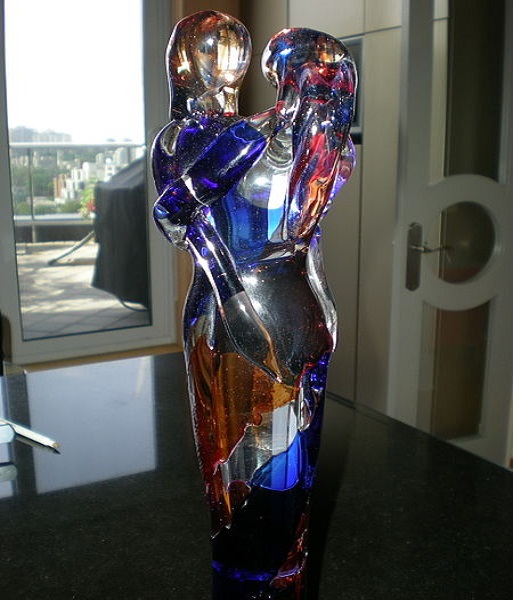 glass figurines hug